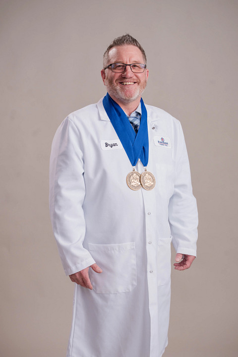 Bryan Allen with medals